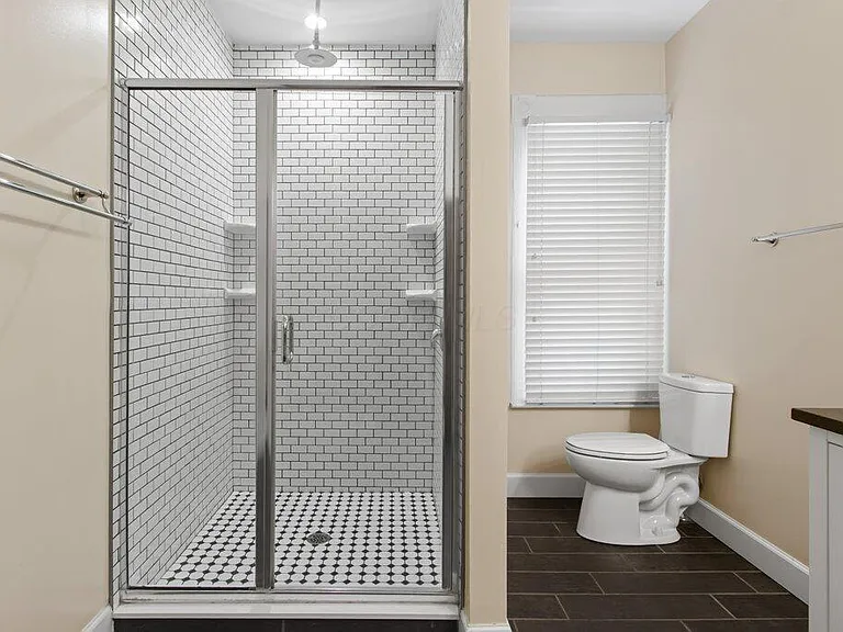 7-foot rain shower with Kohler Moxie Bluetooth speaker