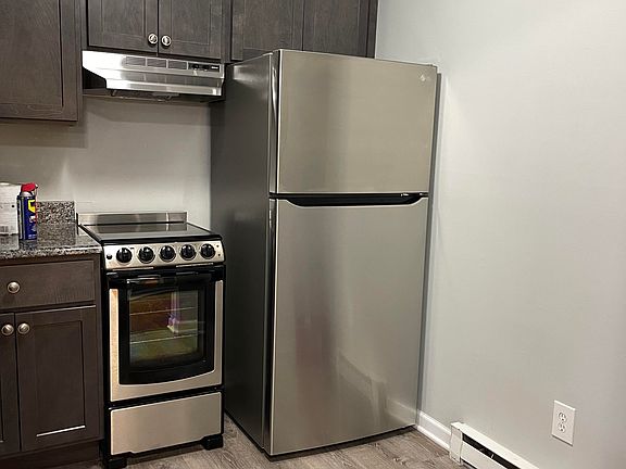 Brand new kitchen with stainless steel appliances