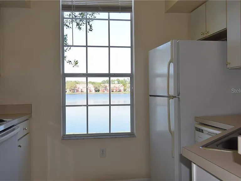 9640 Lake Chase Island Way — Photo 11
