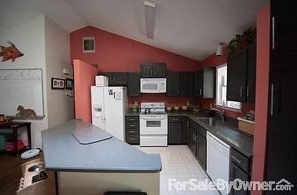 Kitchen
						:
						Solid surface countertops updated in 2010; IKEA pantry; appliances convey