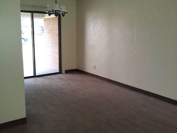 Dining room with sliding glass door.