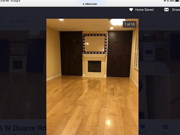 Large spacious living room with Great Wall units for storage