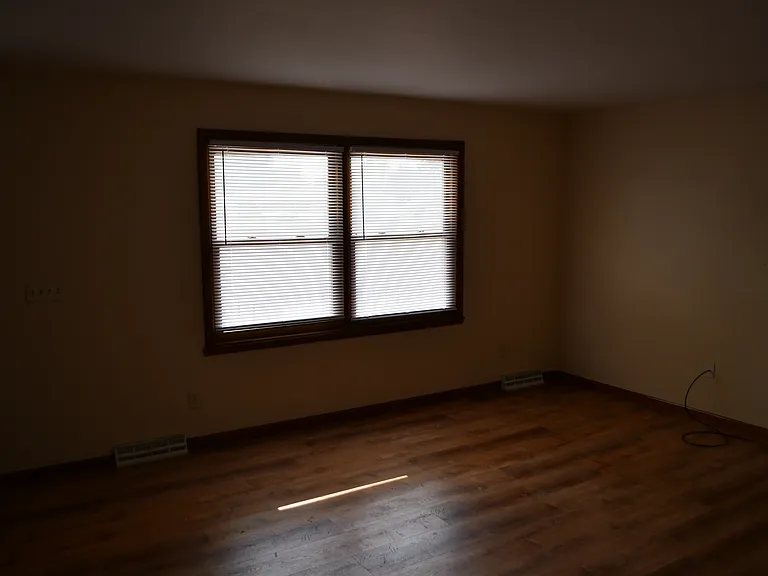 Large living room just inside the front door with plenty of light