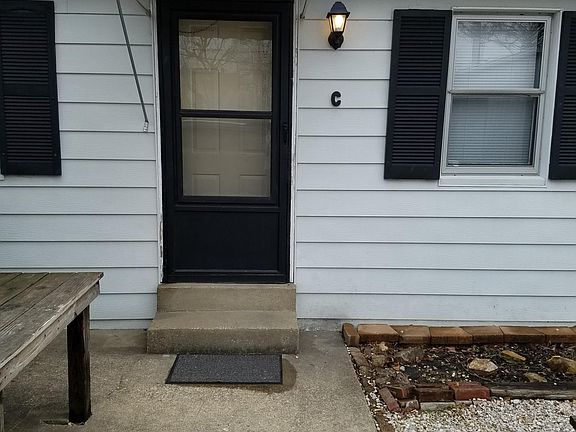 private entrance to apt from off street fenced-in parking lo