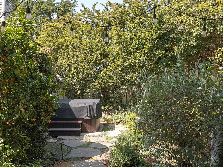 Path to Hot tub in the backyard