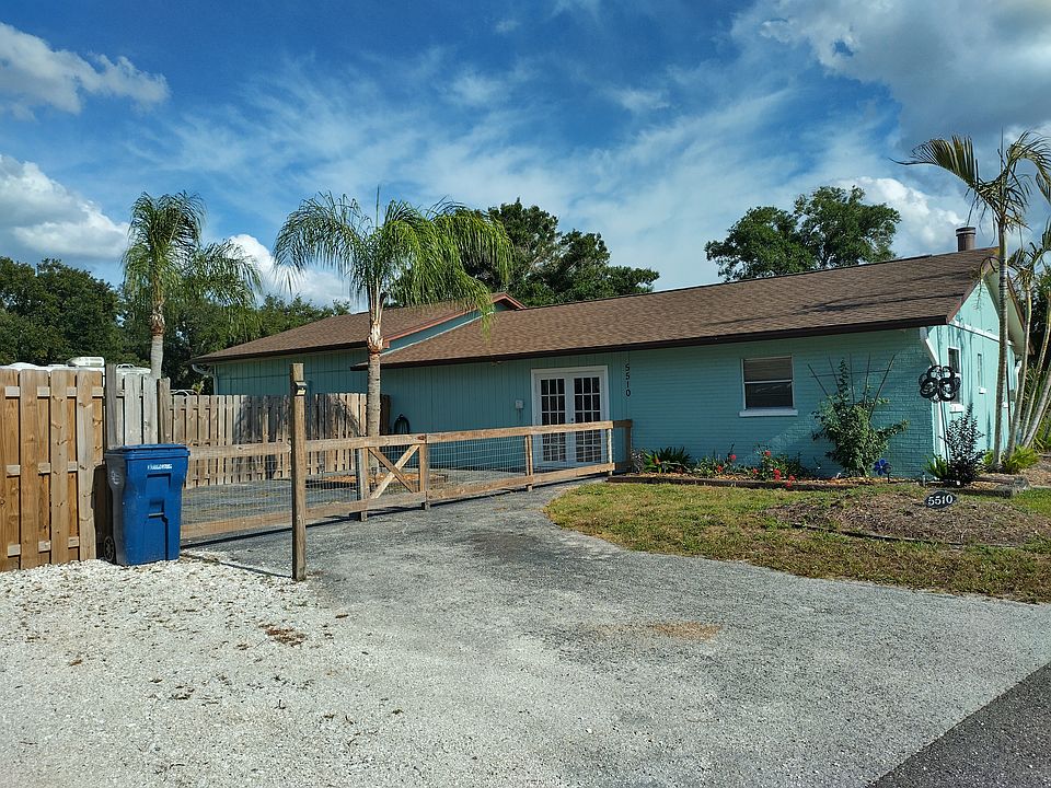 Front of cottage with courtyard.