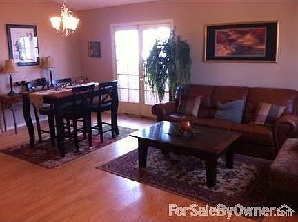 Open Floor Plan
						:
						Living Room / Dining Room for easy entertaining. French Doors lead to backyard.