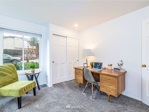 The main floor office/den is just off the entry.