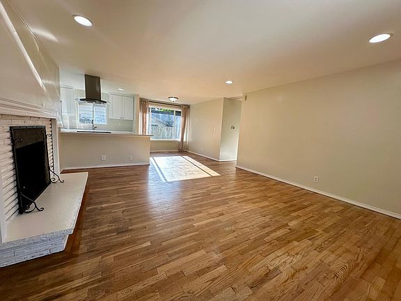 Open floor living room with hardwood floors