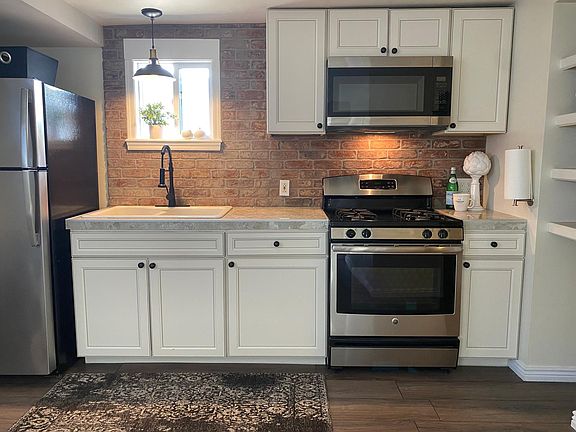 Newer cabinets with marble look counters