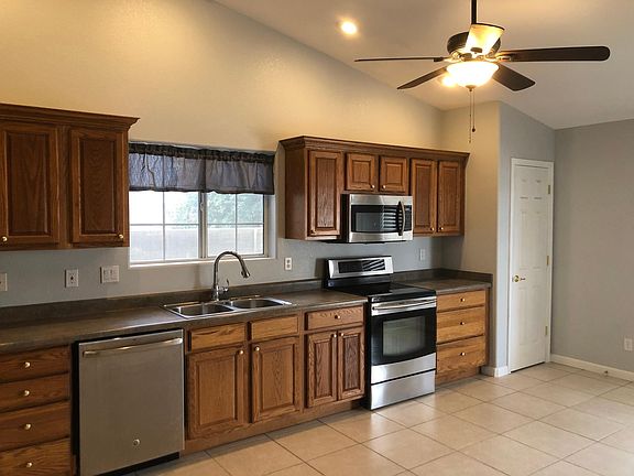 Kitchen w Microwave, Gas Range and Dishwasher