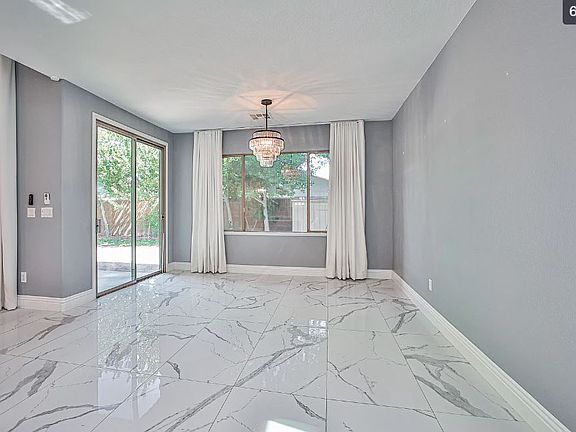 3rd image of 9956 Village Walk Ave