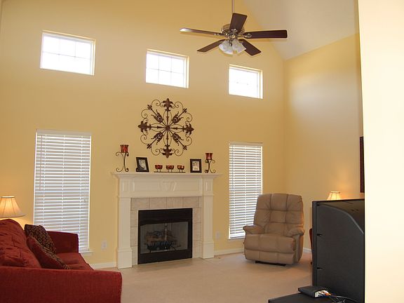 Beautiful Livingroom With Cathedral Ceilings & Catwalk & Lots of Windows!