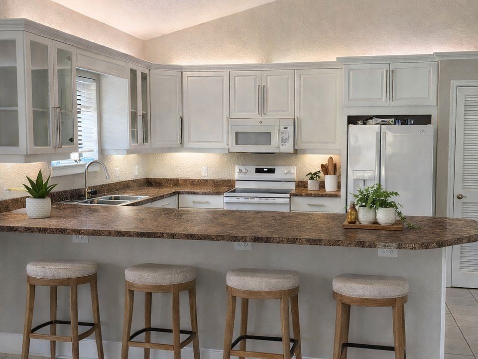 kitchen: newly painted cabinets inside and out
