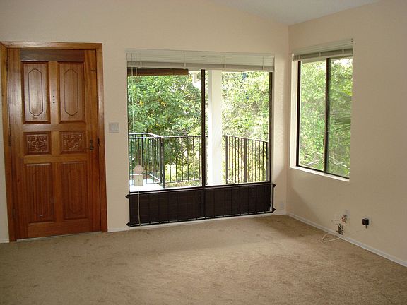 Looking out to Lanai View from LR - New Flooring & Paint throughout