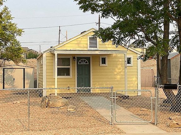 Front walk ramps up, no step