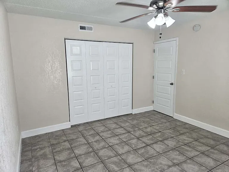 Large primary bedroom with an extra-large closet for ample storage