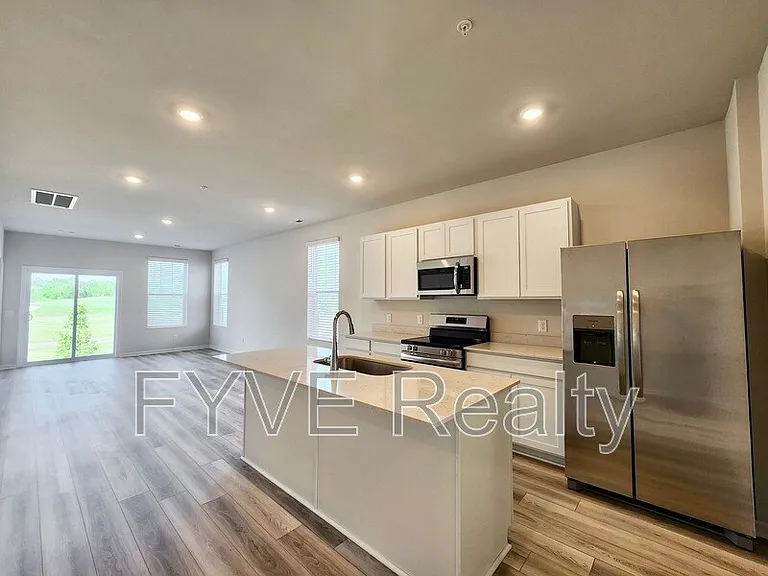 Experience the sleek, contemporary design of this modern kitchen
