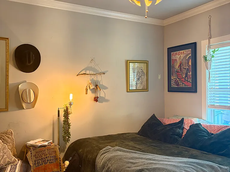 Third bedroom, which is downstairs - great for guests or use as a home office. Also has an ensuite bathroom that can also be accessed from a hallway for visitors. *NOTE: house comes unfurnished (pics show current owner's furnishings that will be moved).*