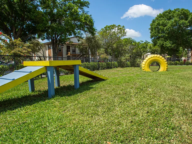 Unleash the fun at our on-site dog park, complete with engaging obstacle course equipment for your furry friends!