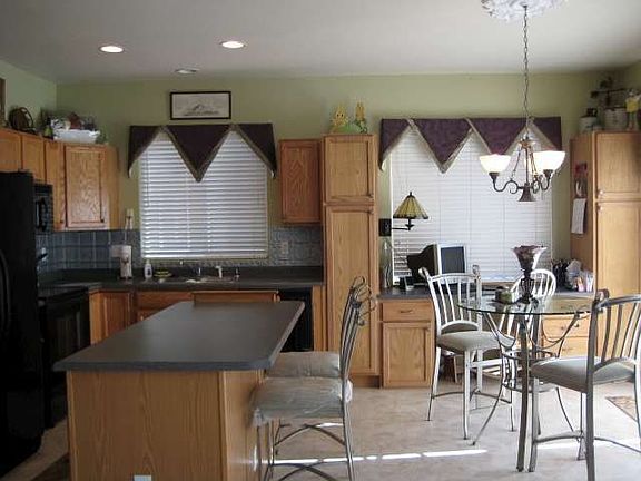 Spacious kitchen w/large island and walk-out