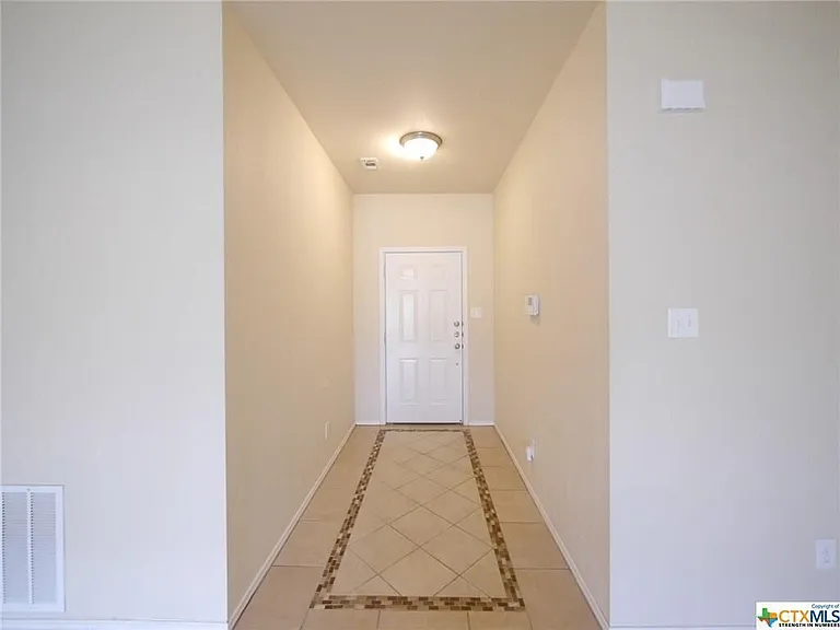 Decorated tile entry.