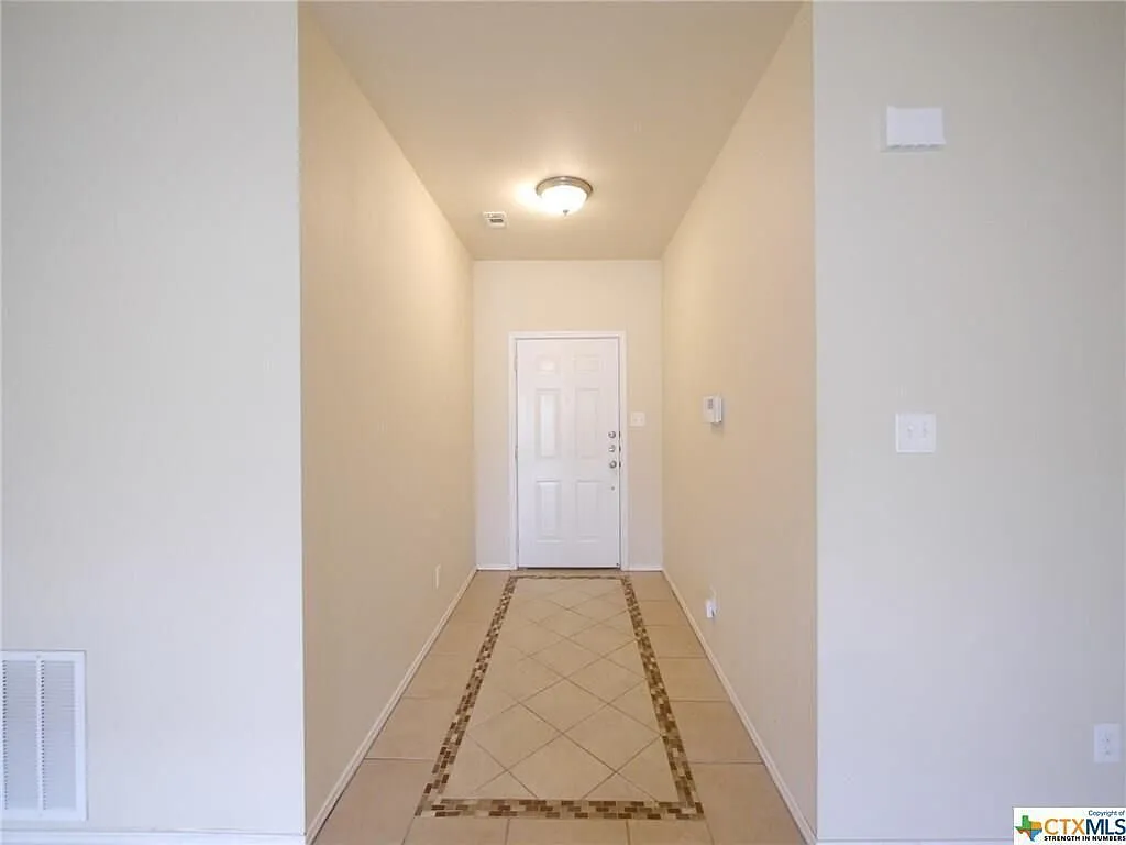 Decorated tile entry. - 3906 Jack Barnes Ave
