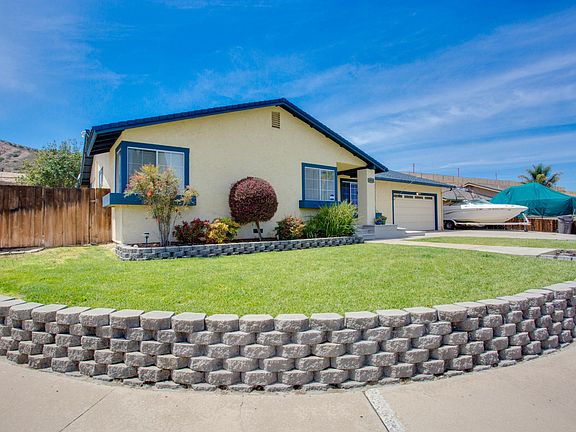 2 car garage and rv/ boat parking on side