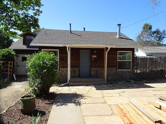 Front of the home, garage to the left, dormer window is the room over the garage