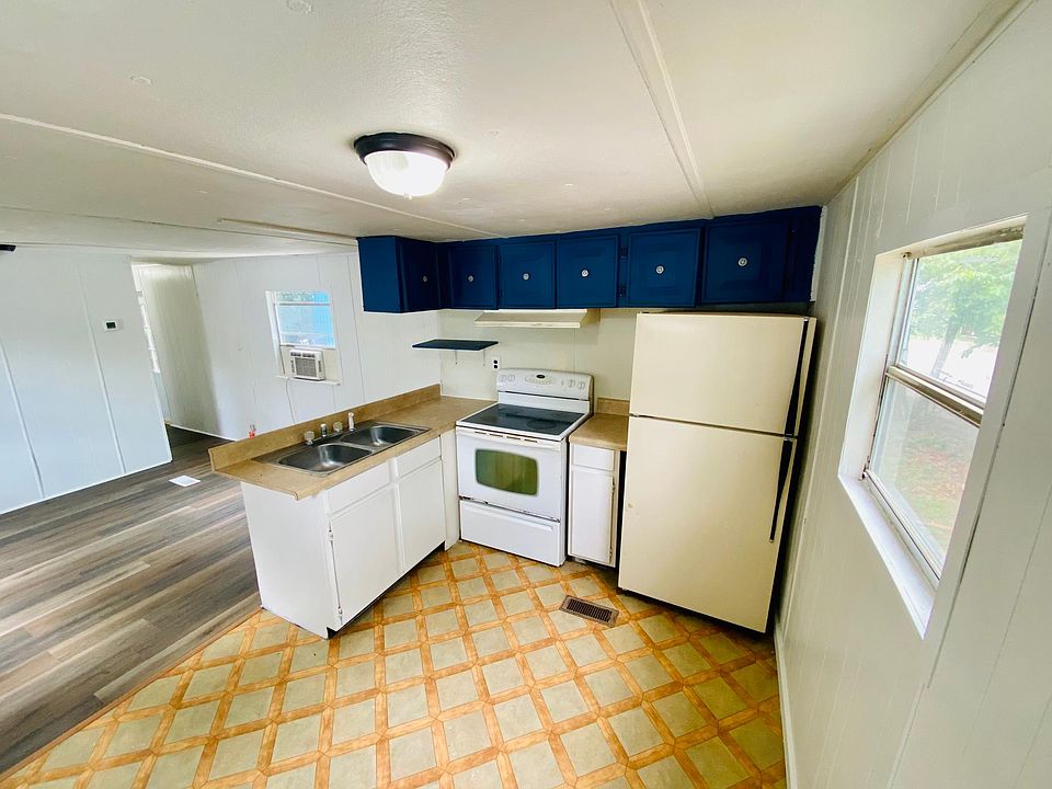 New kitchen stove with freshly painted kitchen cabinets