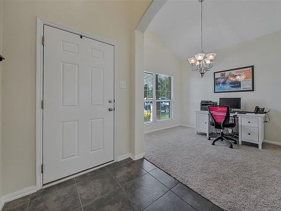 Front dining is being used as the study and has a large window bringing in tons of natural lighting !