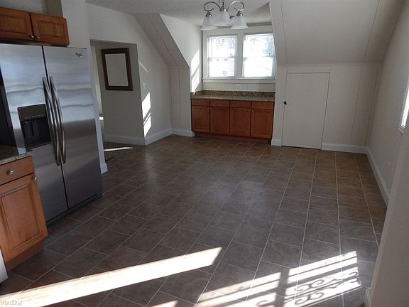 Large dining area with access to beautiful roof deck and sto