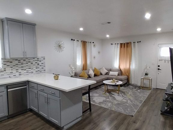 Living room viewed from kitchen
(Staging furniture/decor not included)
