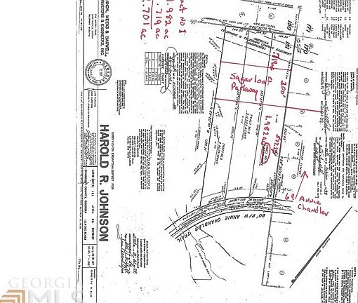 Adjoining 2.7 ac. Lot included in price