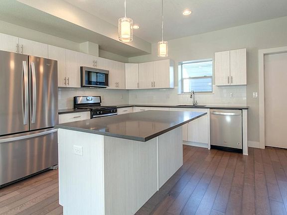 Beautiful, open kitchen. Brand new stainless steel appliances!