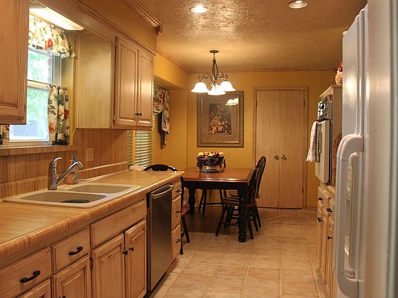 Kitchen - Granite and tile backspash coming early  July