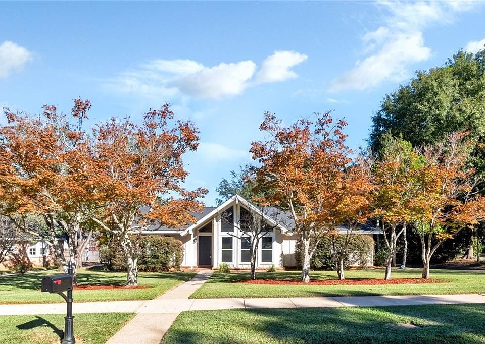 View of front of property with a front lawn