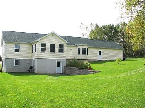 Rear faces treed back yard