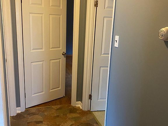 Hallway between bedrooms and bathroom