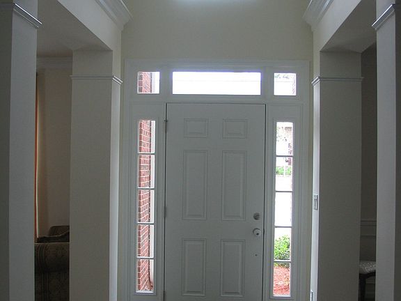 2-Story Foyer (tiled) w/columns leading into formal areas