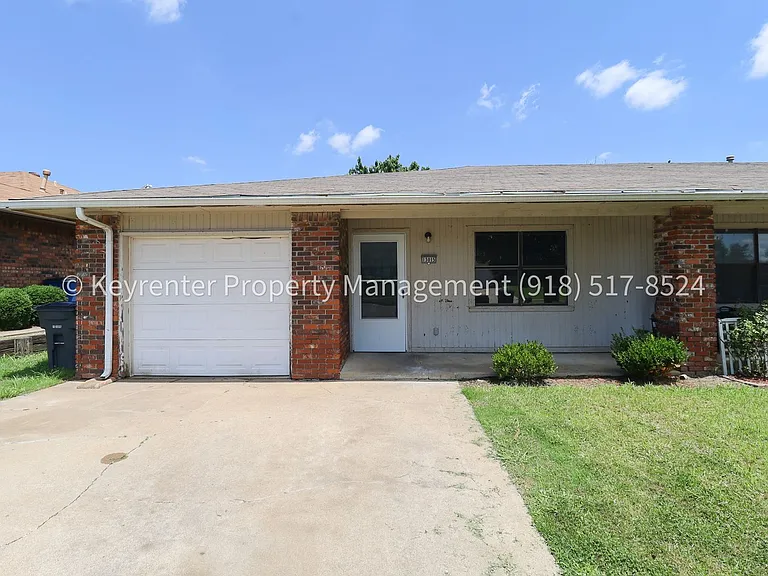 E 39th Pl Quadplex — Photo 1