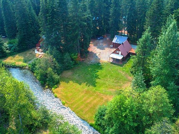 Eagles eye view of this lovely home, shop and lot. 2 tax parcels, vacant lot is buildable if you wanted to add a garage/shop/cab