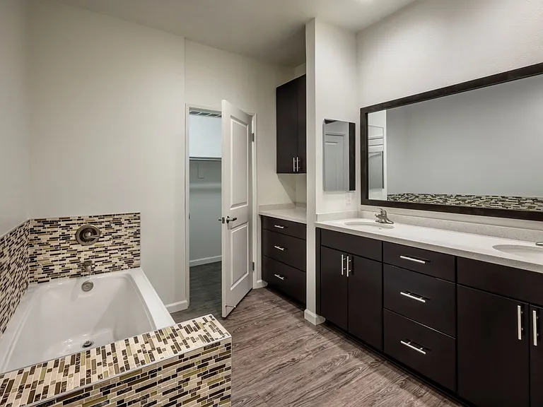 Apartments in Hollywood, CA - Apartment Bathroom Double Vanity, Bathtub and Closet summit