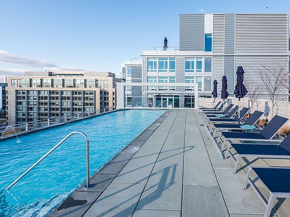 Rooftop deck with pool and grills