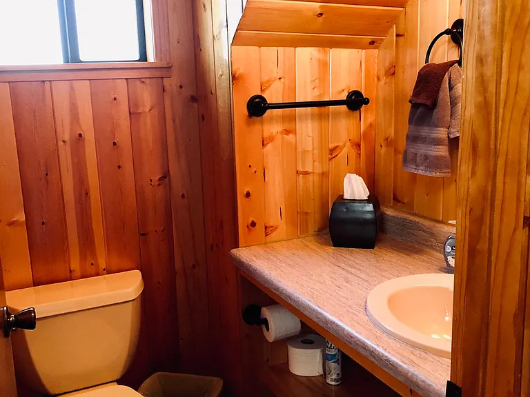 First floor 1/2 bathroom off the kitchen.