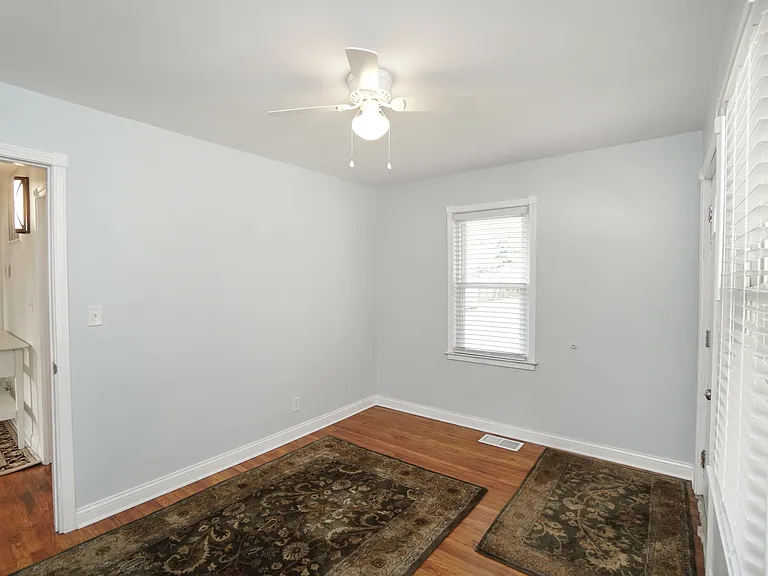 Bedroom with walkout to carport