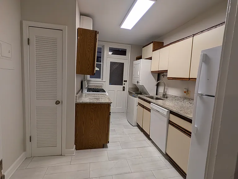 Kitchen with tiled floor, new ceiling light
