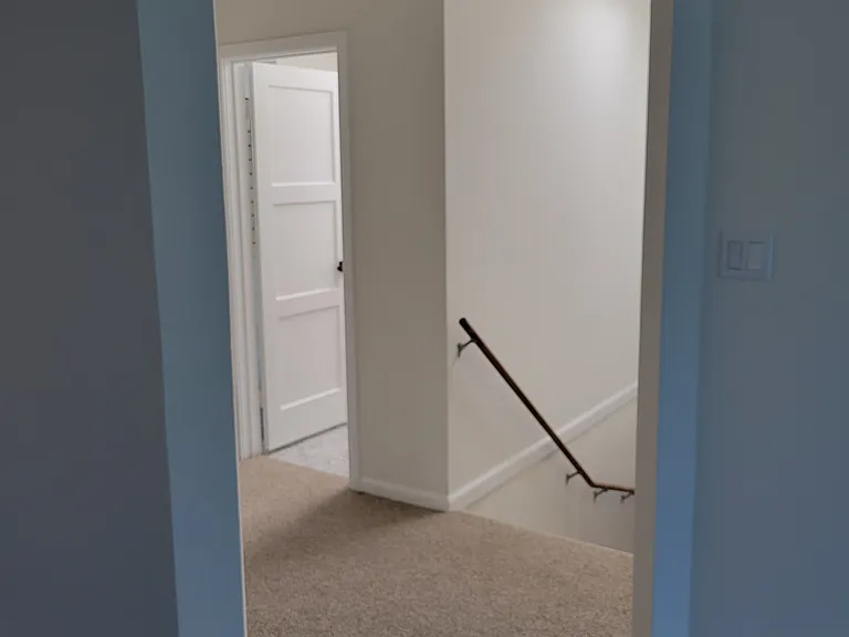 Top of staircase towards bathroom