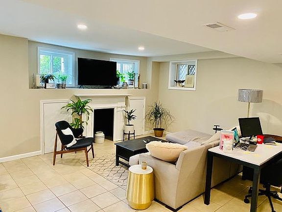 Large open area for living room, office, dining room. Faux fireplace