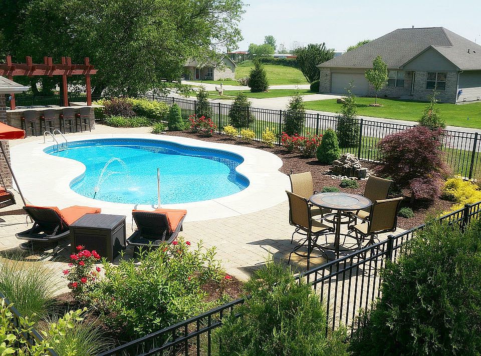 Back Fenced In Pool Area